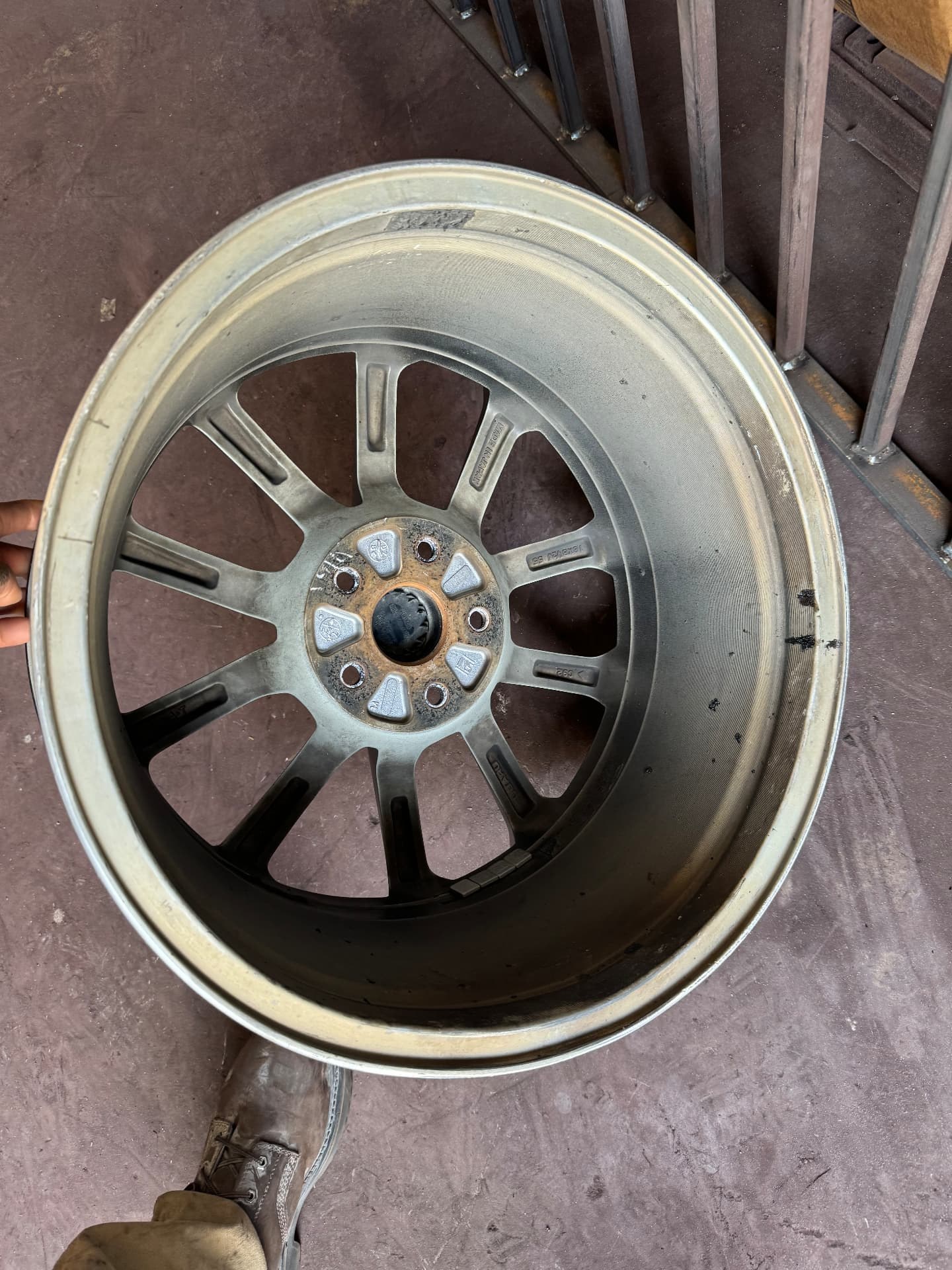 Alloy wheel rim photographed following repair